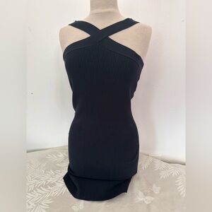 The drop Black Ribbed Cross-Back Dress